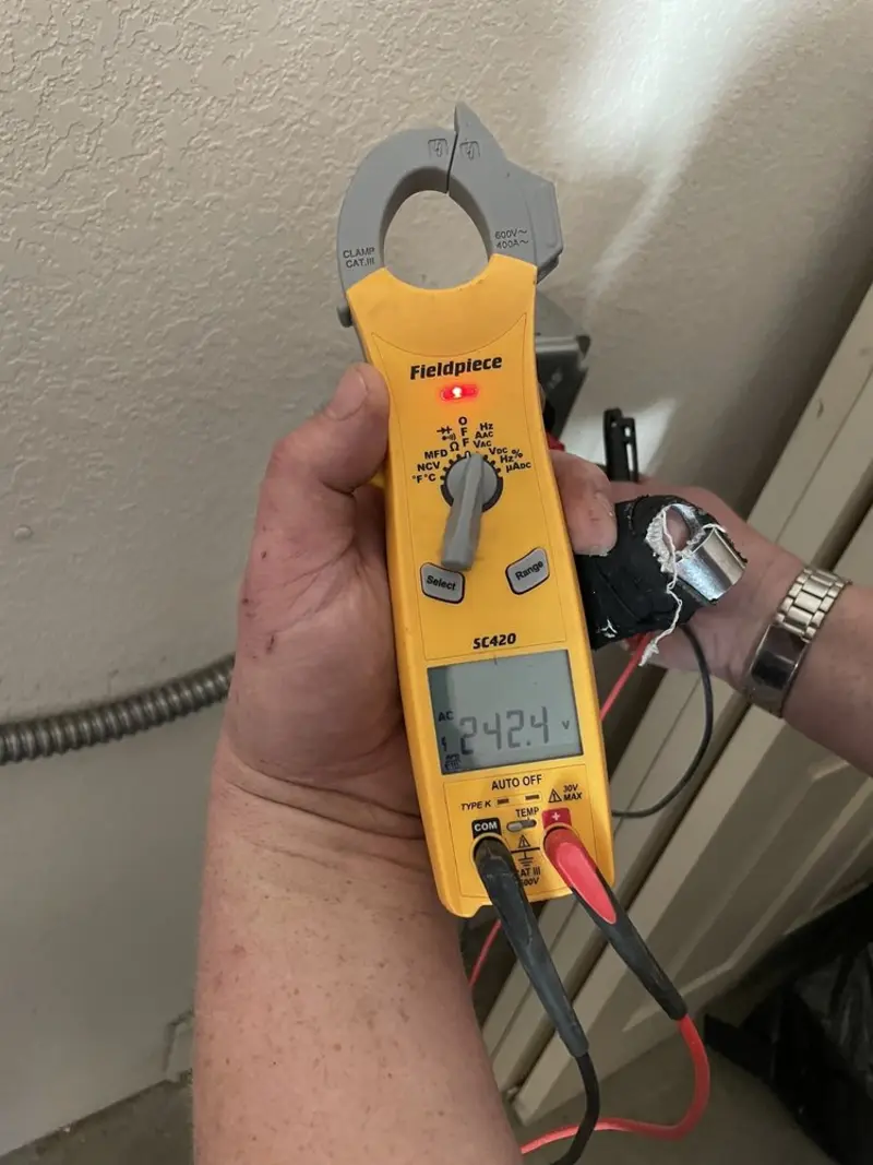 Voltage testing with clamp meter during Aluminum Wiring Replacement in Placitas